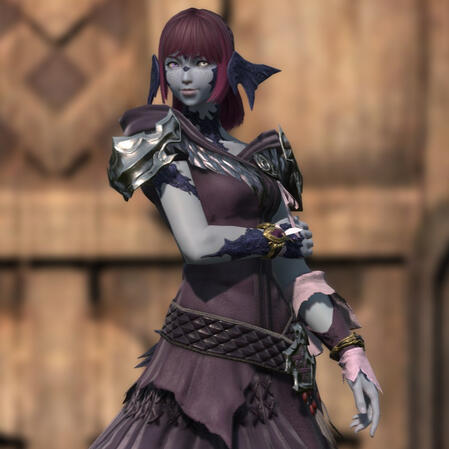 A screenshot taken in Final Fantasy XIV (14). It is from the waist up, showing the player character, Maral Borlaaq. She is standing in a relaxed pose, one arm across her chest to hold the other arm at the elbow.